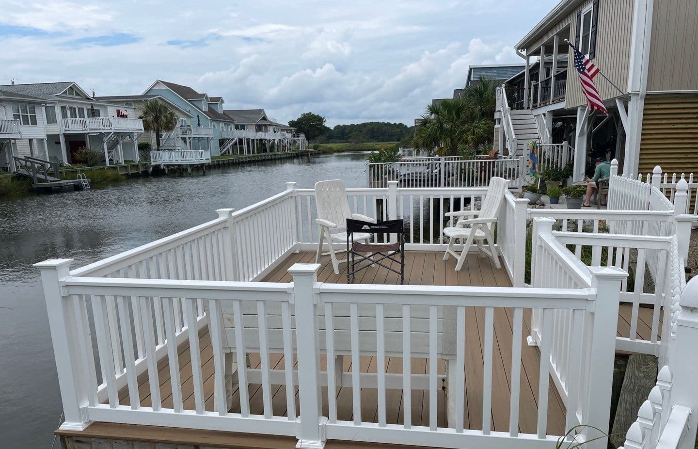 A photo of a brown and white TimberTech Decking deck overlooking a body of water in North Myrtle Beach, South Carolina.