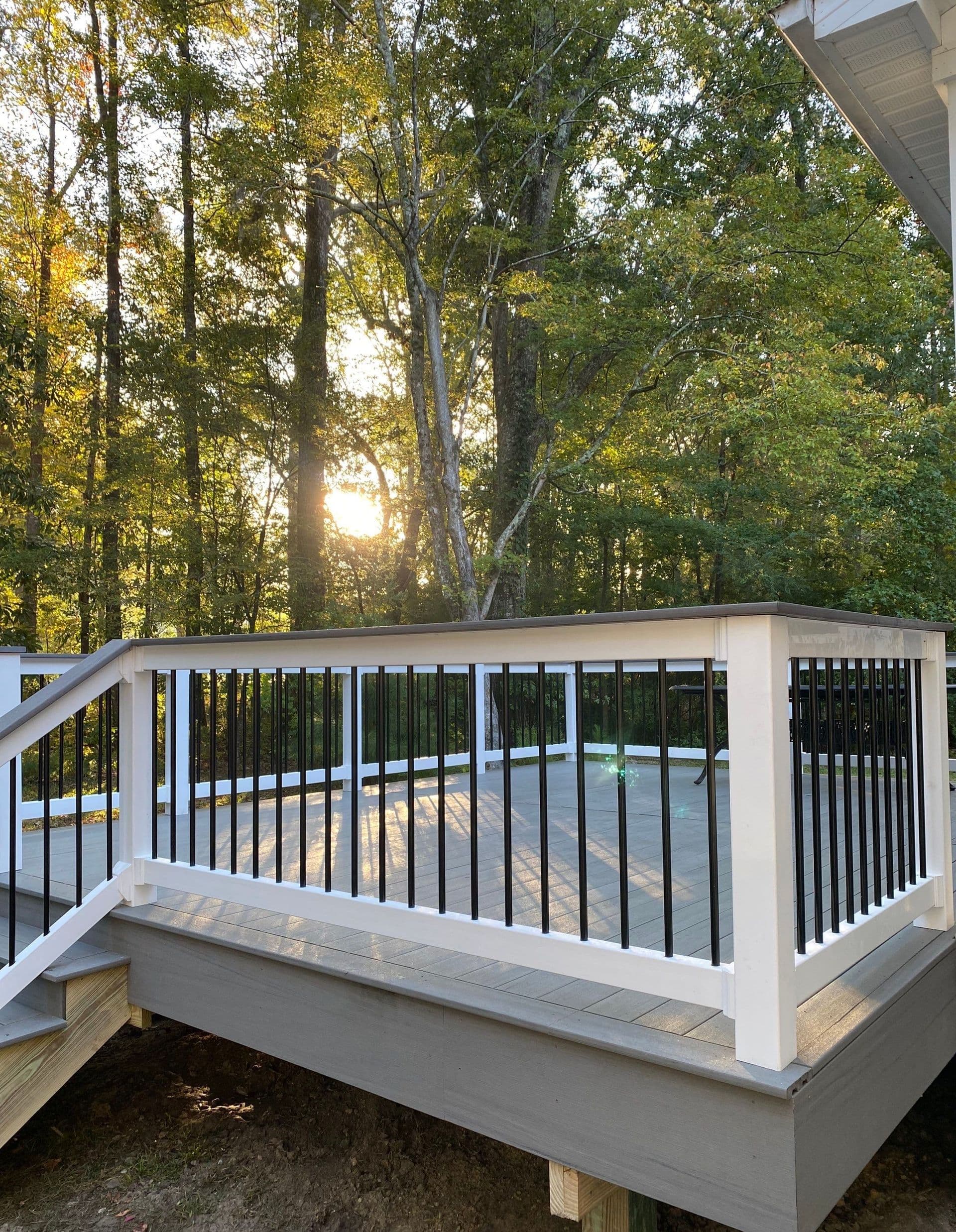 A Photo of a TimberTech Decking deck with white posts and black metal railings in North Myrtle Beach, South Carolina.